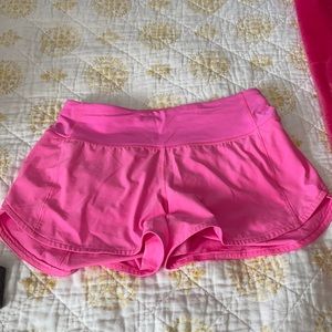 Pink lululemon speed up shorts